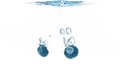 Two blueberryÃ¢â¬â¢s splashing into crystal clear water Royalty Free Stock Photo